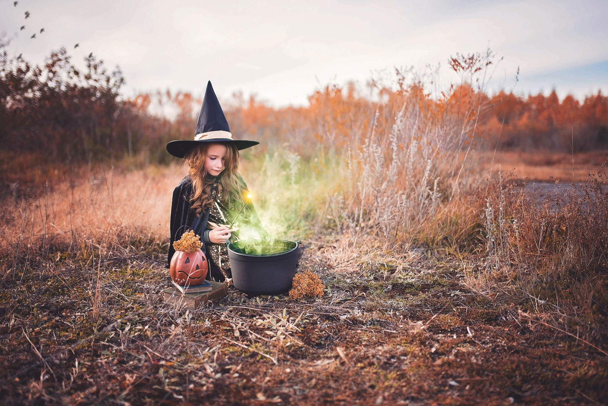 Girl wearing a witch costume