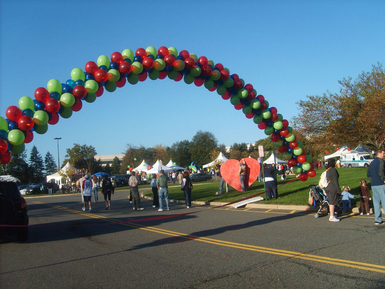 big balloon arch over street