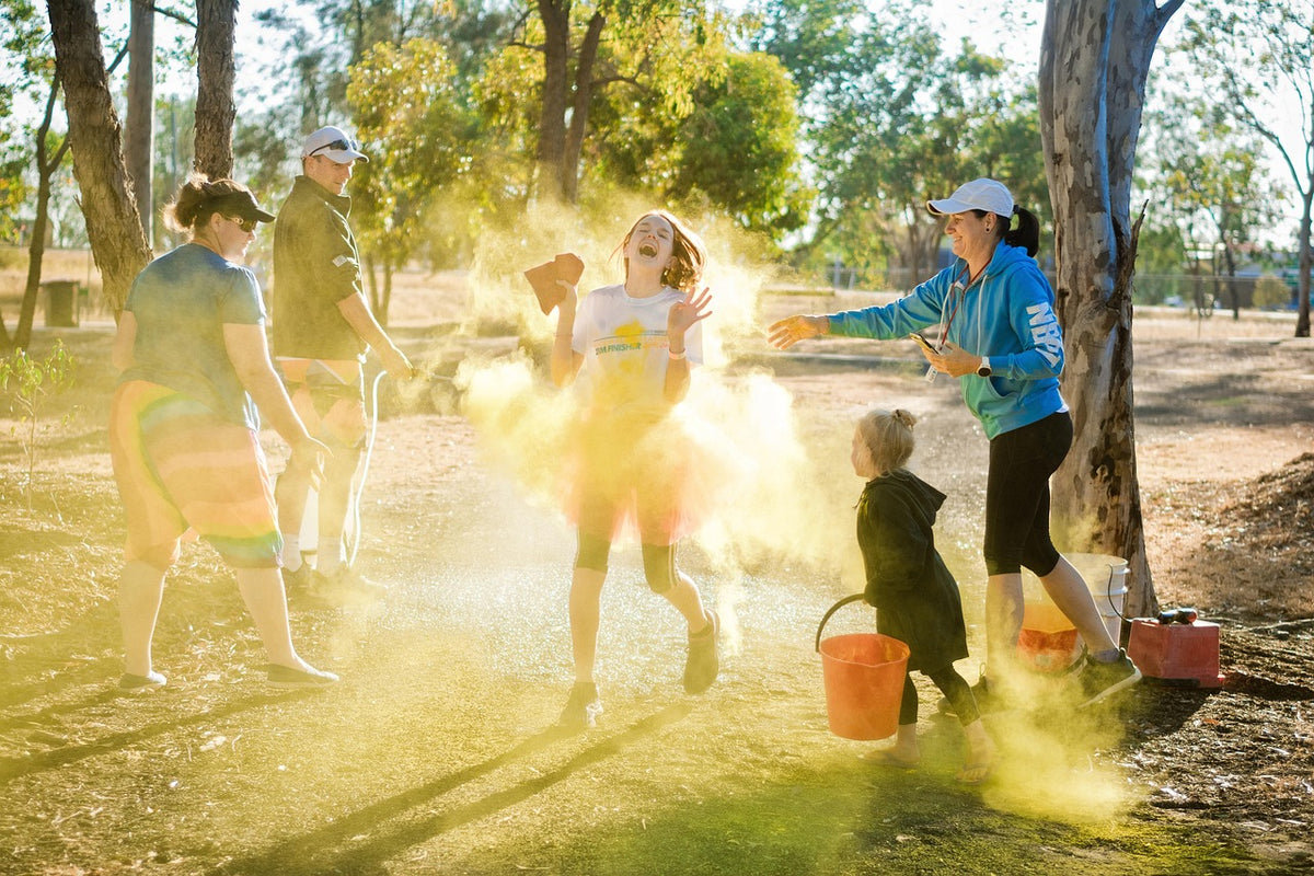 A family doing fun outdoor party activities.