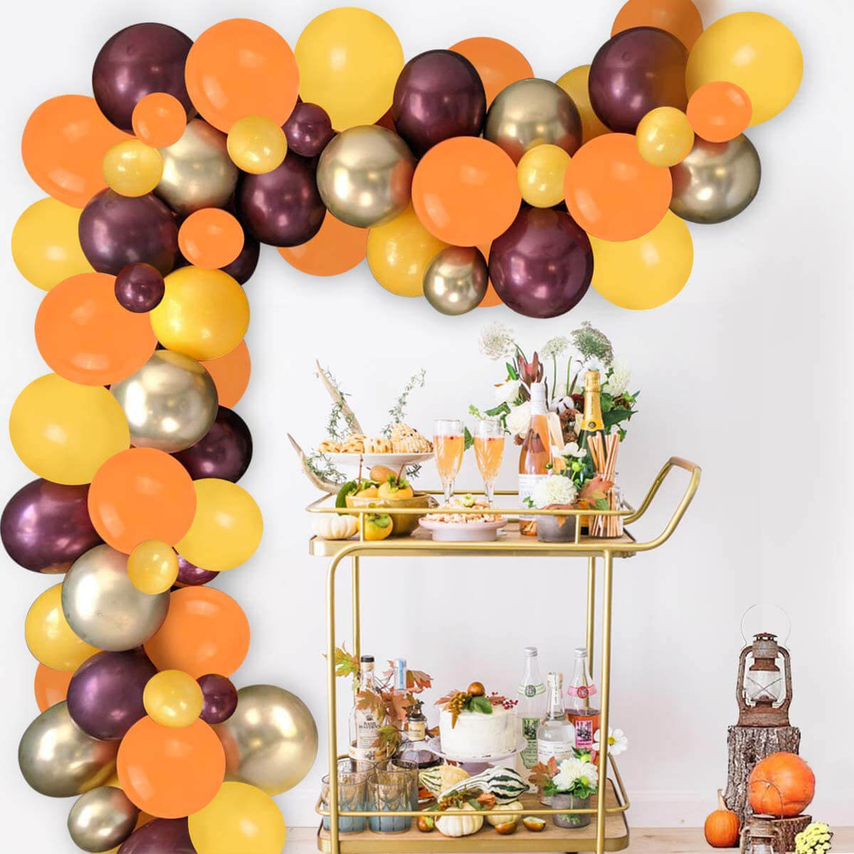 thanksgiving and fall balloon decorations with balloon garland