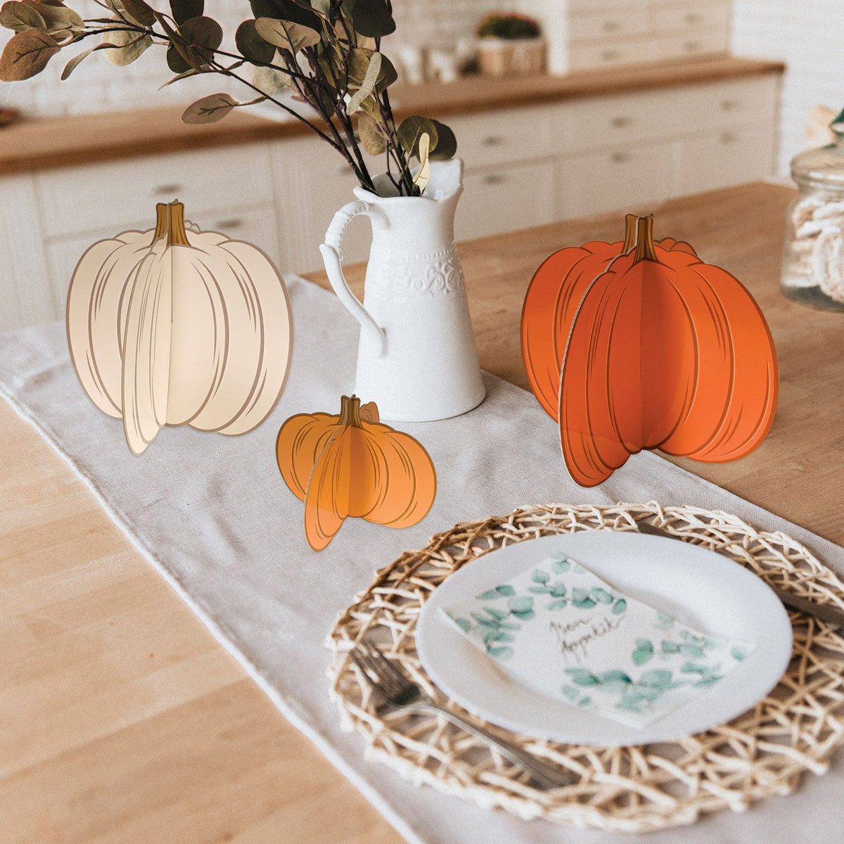 pumpkin decorations on table for autumn 