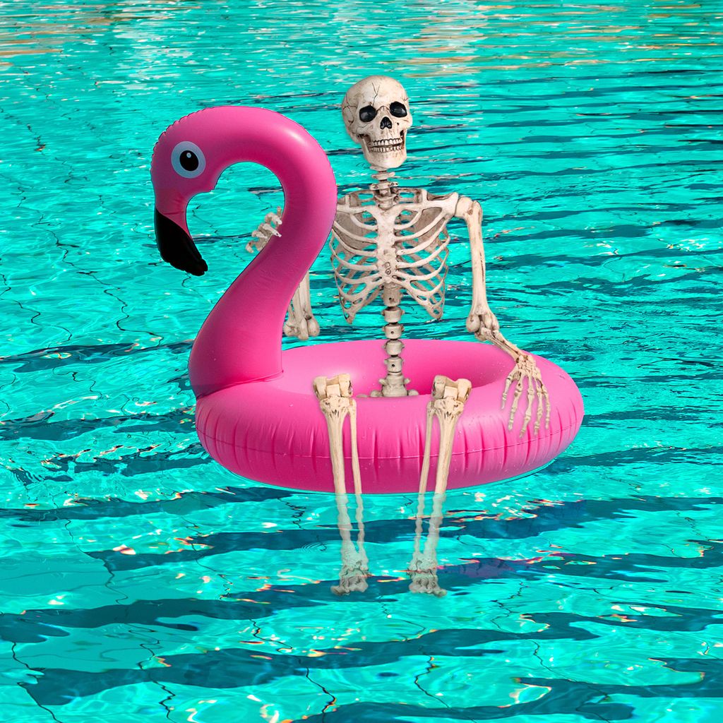 skeleton on pink flamingo float