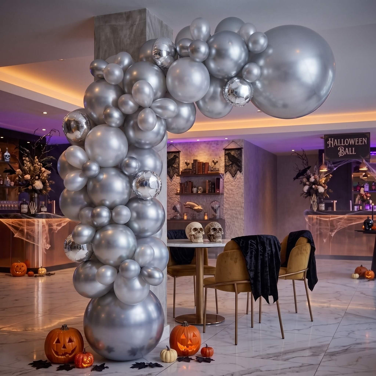 silver balloon garland with pumpkins