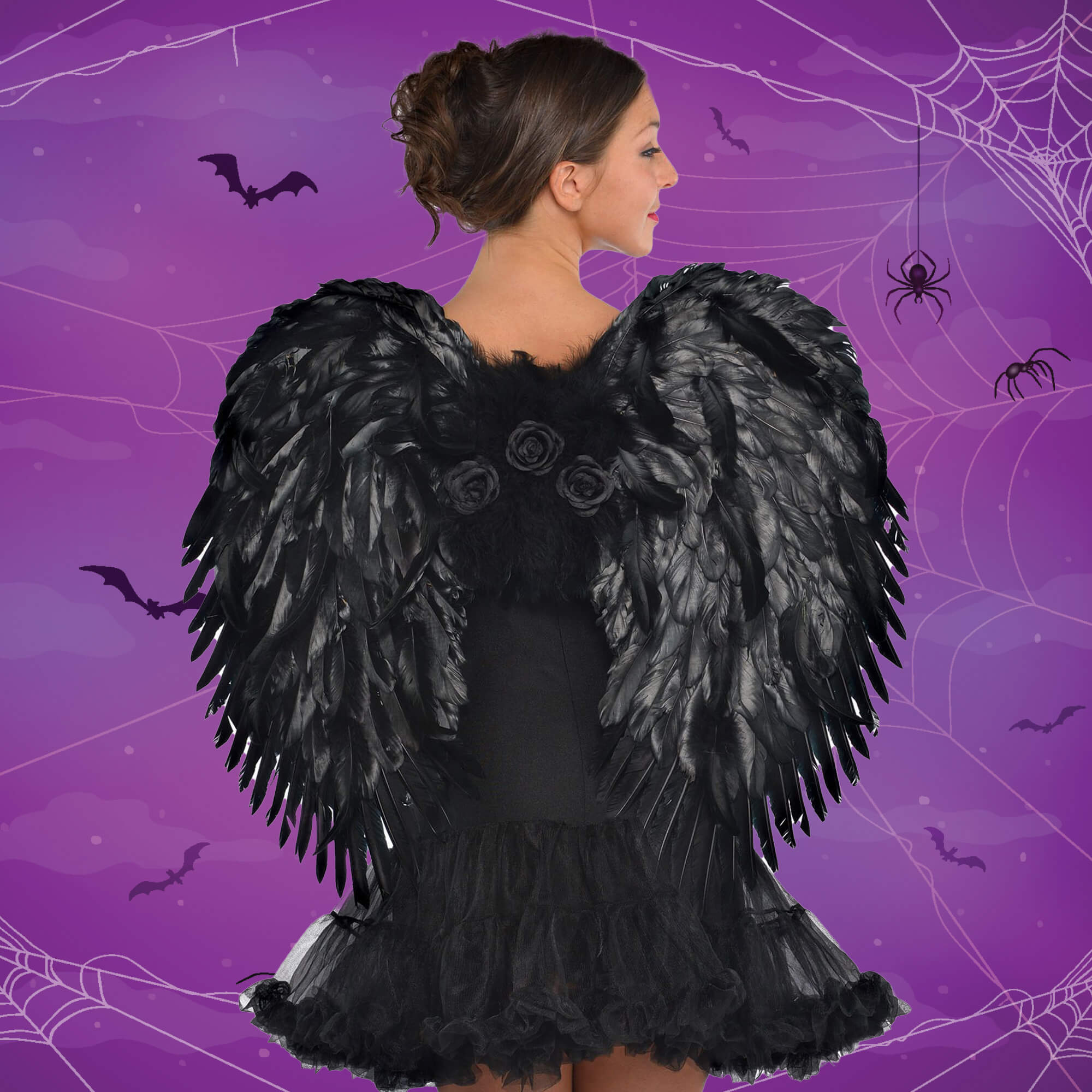 Black wings on back of woman for halloween costume
